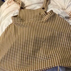 Brown and white checkered overall dress